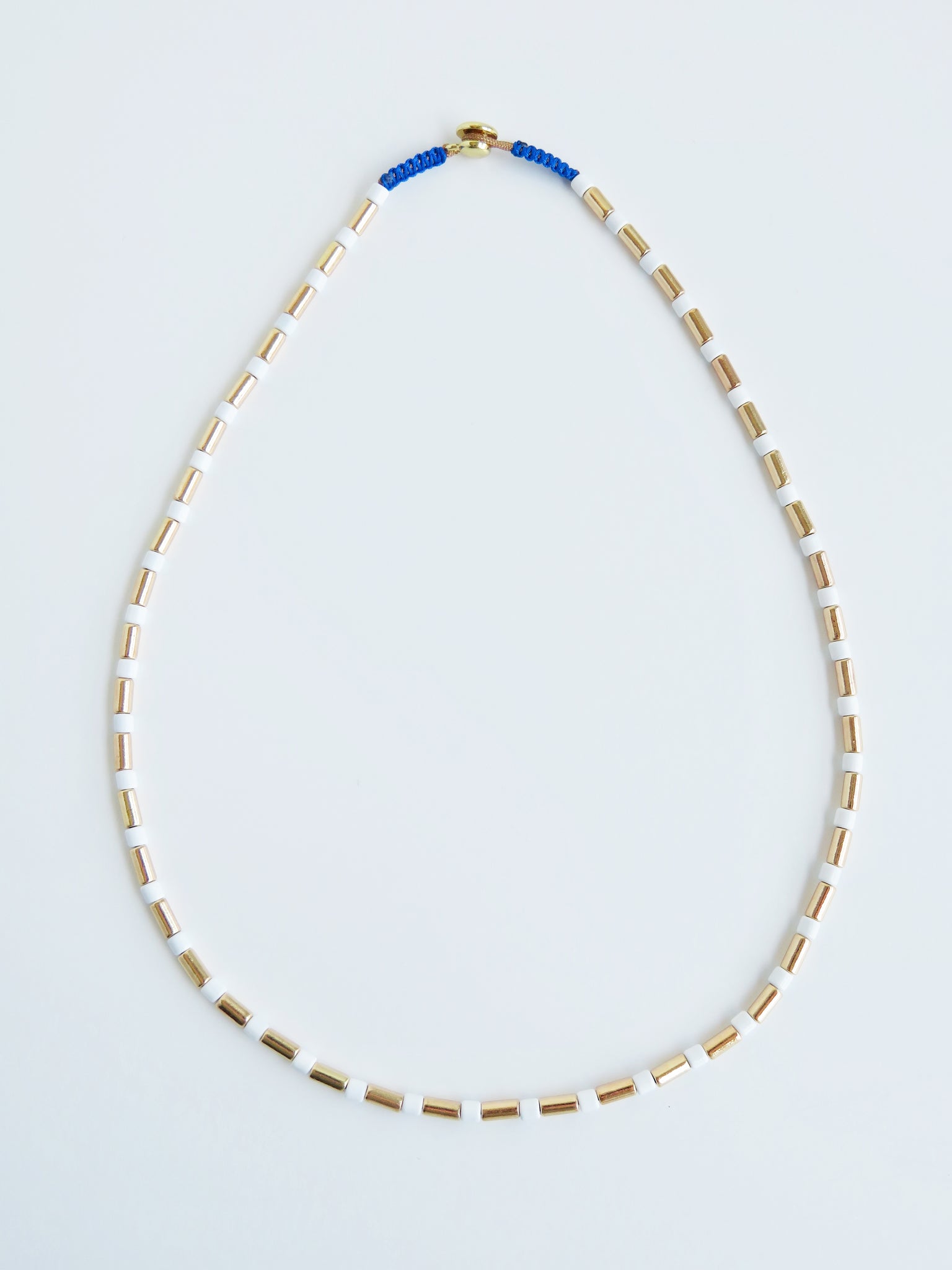 Stella Enamel Tube Necklace - White & Gold with Blue Cord