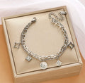 Keep The Faith Charm Bracelet - Love. Luck. Hope & Faith
